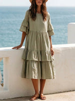 Loose-fitting Cotton-linen Midi Dress Featuring A Round Neck, Double-layer Ruffle Sleeves, And A Three-tiered Ruffled Skirt.