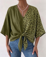 Casual-chic Linen And Cotton Top Featuring A Solid Color And Leopard Print Panel Design.