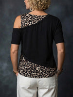 Black-based Leopard Print Color-block Spliced off-shoulder Top With Elbow-length Sleeves, A Round Neck, And An Asymmetrical Faux-layered Design