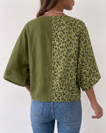 Casual-chic Linen And Cotton Top Featuring A Solid Color And Leopard Print Panel Design.