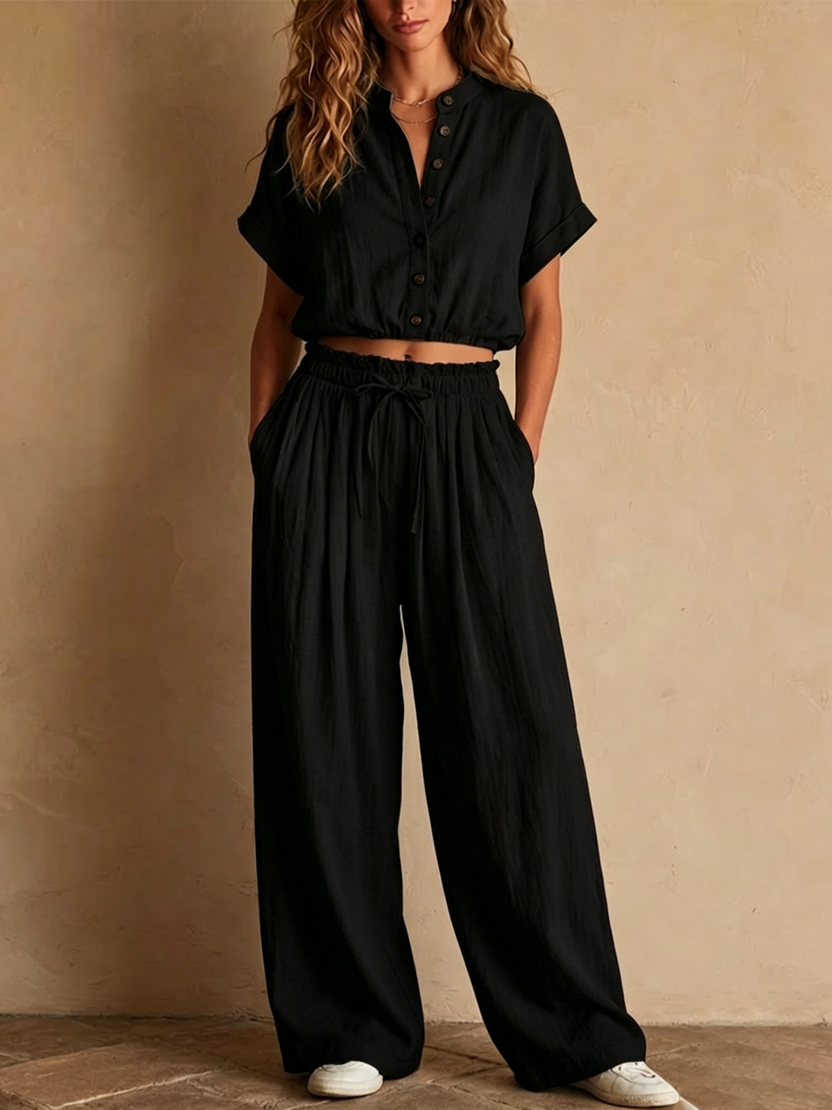 Two-piece Linen Set Featuring A Cropped, Half-button Top With A Stand Collar, Wooden Buttons, And Roll-up Sleeves, Paired With Wide-leg Trousers Featuring An Elastic Drawstring Waist