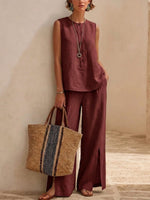 Minimalist, Relaxed-fit Textured Sleeveless Top With Partial Button Placket And Matching Draped, Side-slit Wide-leg Trousers Set