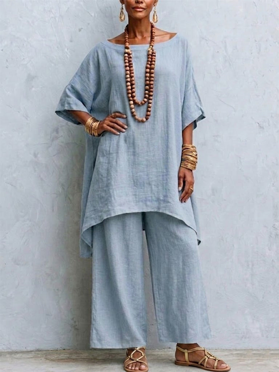 Two-piece Set Featuring A Boat-neck Linen Top With Batwing Sleeves And An Asymmetrical Hem, Paired With Wide-leg Trousers