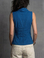 Stylish And Elegant Sleeveless Linen-cotton Blend Top With A Draped Neckline.