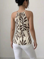 Printed Sleeveless Wrap-style Linen And Cotton Top