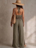 Vertical-striped Cotton Wide-leg Jumpsuit Featuring A Halter Neck, Deep V-neck, Drawstring Elastic Waist, And Side Slits